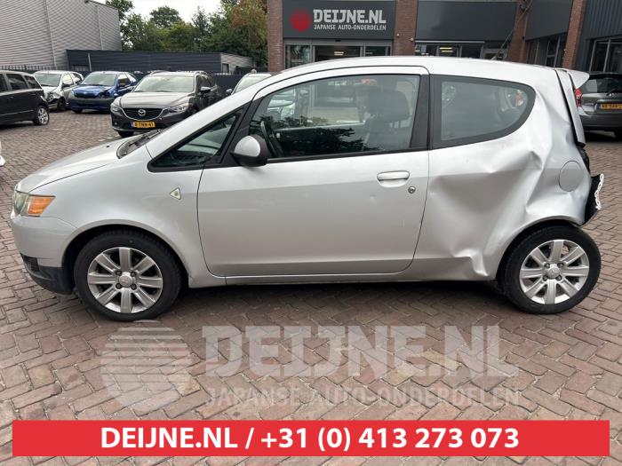 Mitsubishi Colt Portierruit 2Deurs links O625741