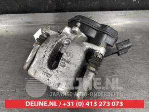 Nissan Juke Remklauw (Tang) links-achter O625901 foto 2