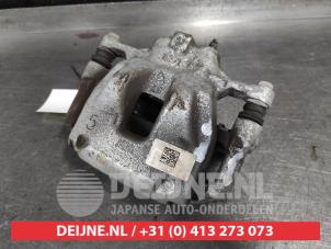 Toyota Yaris Cross Front brake calliper, left O626736 photo 2