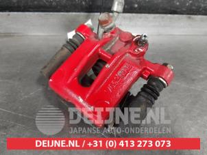 Toyota Corolla Bremszange links hinten O626979 foto 2