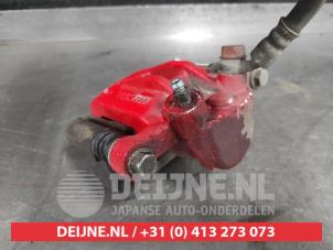 Toyota Corolla Bremszange links hinten O626979 foto 3