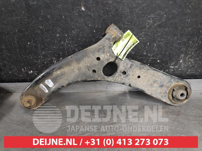 Kia Rio Draagarm onder links-voor O627658
