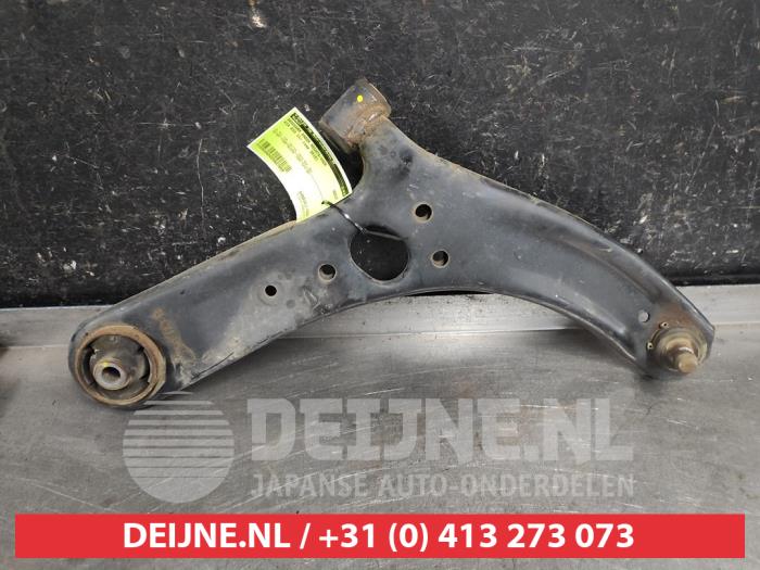 Kia Rio Draagarm onder rechts-voor O627659