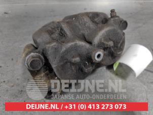 Mitsubishi Pajero Front brake calliper, left O627858 photo 3