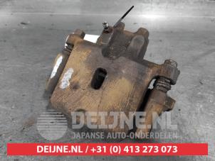 Mitsubishi Pajero Rear brake calliper, left O627859 photo 2