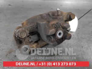Mitsubishi Pajero Rear brake calliper, left O627859 photo 3