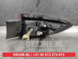 Mitsubishi Colt Taillight, left O628403 photo 2