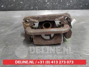 Nissan X-Trail Rear brake calliper, left O628656 photo 2