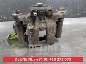 Nissan X-Trail Rear brake calliper, left O628656 photo 3