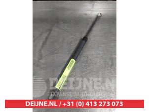 Nissan Micra Gasdemper links-achter O629863 foto 2