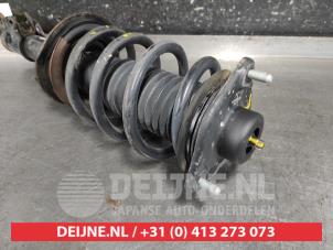 Hyundai IX35 Schokdemperpoot links-voor O630443 foto 2