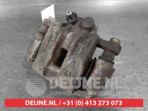 Hyundai IX35 Bremszange links hinten O630487 foto 2
