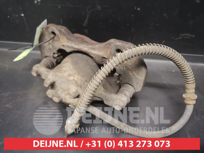 Mitsubishi Lancer Front brake calliper, left O630974