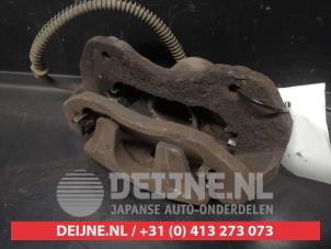 Mitsubishi Lancer Remklauw (Tang) links-voor O630974 foto 2
