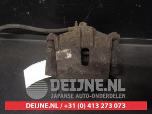 Toyota Yaris Front brake calliper, right O631051 photo 2
