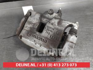 Mazda CX-30 Remklauw (Tang) links-voor O631112 foto 2