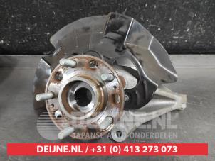 Kia Sportage Achsschenkel rechts vorne O631390 foto 2