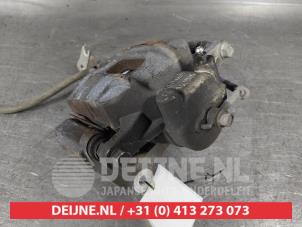 Kia Sportage Front brake calliper, right O631404 photo 3