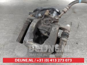 Kia Sportage Bremszange links hinten O631405 foto 2
