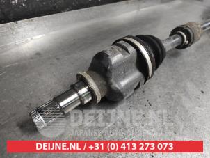 Toyota Yaris Aandrijfas rechts-voor O631633 foto 2