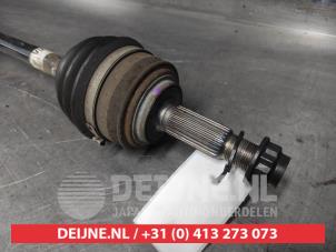 Toyota Yaris Aandrijfas rechts-voor O631633 foto 3