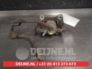 Lexus RX Remklauw (Tang) links-achter O632063 foto 2