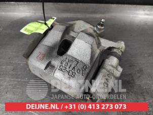 Toyota Prius Plus Bremszange links vorne O632646 foto 2