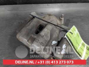 Toyota Auris Bremszange links vorne O632693 foto 2