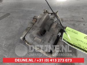 Toyota Auris Bremszange rechts hinten O632705 foto 2