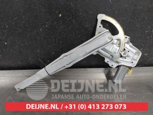 Toyota Yaris Window mechanism 4-door, front left O632747 photo 2