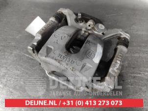 Nissan Qashqai Bremszange links hinten O634246 foto 2