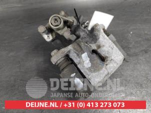 Suzuki Swift Bremszange links hinten O634311 foto 2