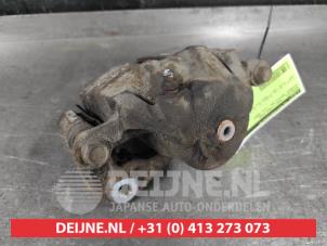 Hyundai Matrix Remklauw (Tang) links-voor O635281 foto 3