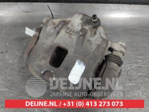 Hyundai Tucson Bremszange links vorne O635405 foto 2