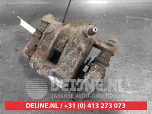 Kia Sportage Rear brake calliper, left O637049 photo 2