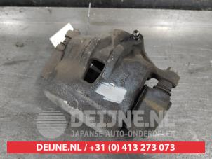 Hyundai IX20 Bremszange links vorne O638115 foto 2