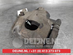 Toyota Aygo Front brake calliper, right O638628 photo 2