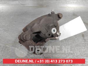 Daihatsu Sirion Front brake calliper, right O639325 photo 3