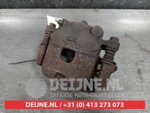 Daihatsu Sirion Front brake calliper, right O639325 photo 2