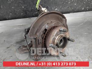 Daihatsu Sirion Achsschenkel links vorne O639329 foto 2