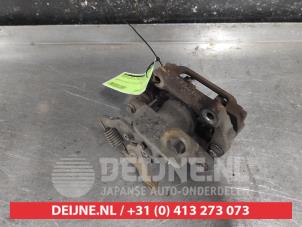 Toyota Avensis Bremszange rechts hinten O639379 foto 2
