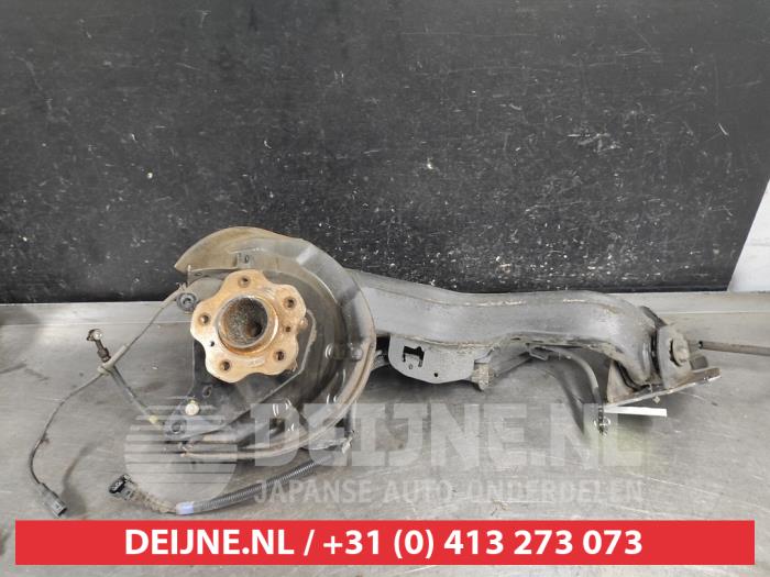 Nissan Qashqai Fusee links-achter O639634