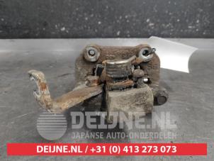 Suzuki Swift Bremszange links hinten O640580 foto 2