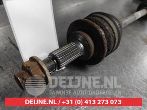 Suzuki Swift Aandrijfas links-voor O640584 foto 2