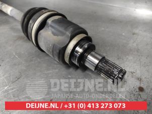Suzuki Swift Aandrijfas links-voor O640584 foto 3