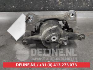 Toyota Corolla Front brake calliper, left O640669 photo 2