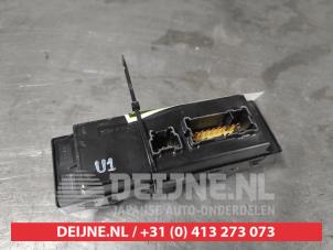 Nissan Navara Multi-functional window switch O640894 photo 2