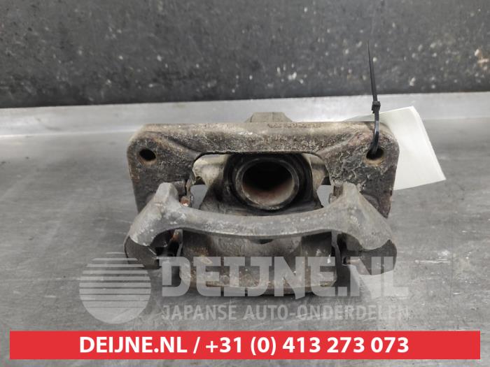 Nissan Navara Remklauw (Tang) links-achter O641205