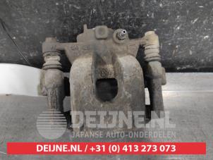 Nissan Navara Rear brake calliper, left O641205 photo 3