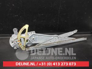 Toyota Yaris Window mechanism 4-door, front left O641905 photo 2